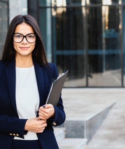 portrait-of-young-successful-businesswoman-wearing-glasses-and-looking-to-camera-professional-female_t20_bA0NWB.jpeg